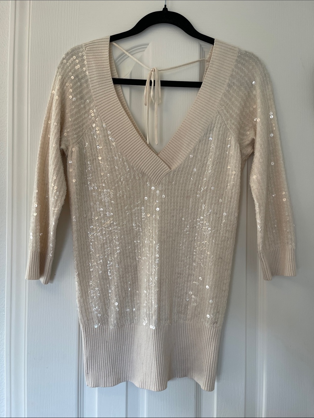 Bebe Sequin V-Neck Knit Sweater in Cream- Small.